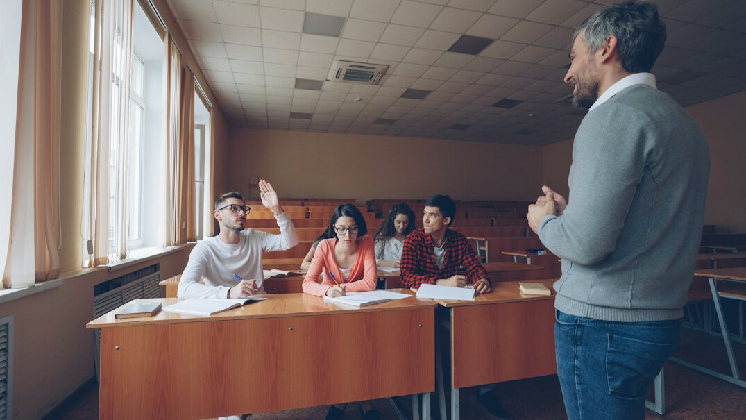 teacher with students in classroom